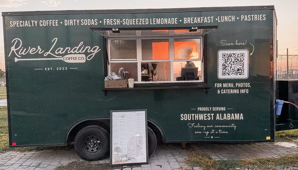 River Landing Coffee Co. food truck at sunrise with its service window and menu board